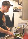 Rockne Roll/News-RegisterKyle Christensen is chef at The Diner.