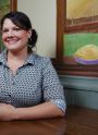 Rockne Roll // DYV
Owner Nora Lamb poses at a table in The Crescent Café.